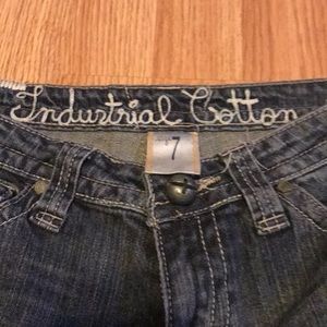 Industrial Cotton Flared Jeans. Dark denim